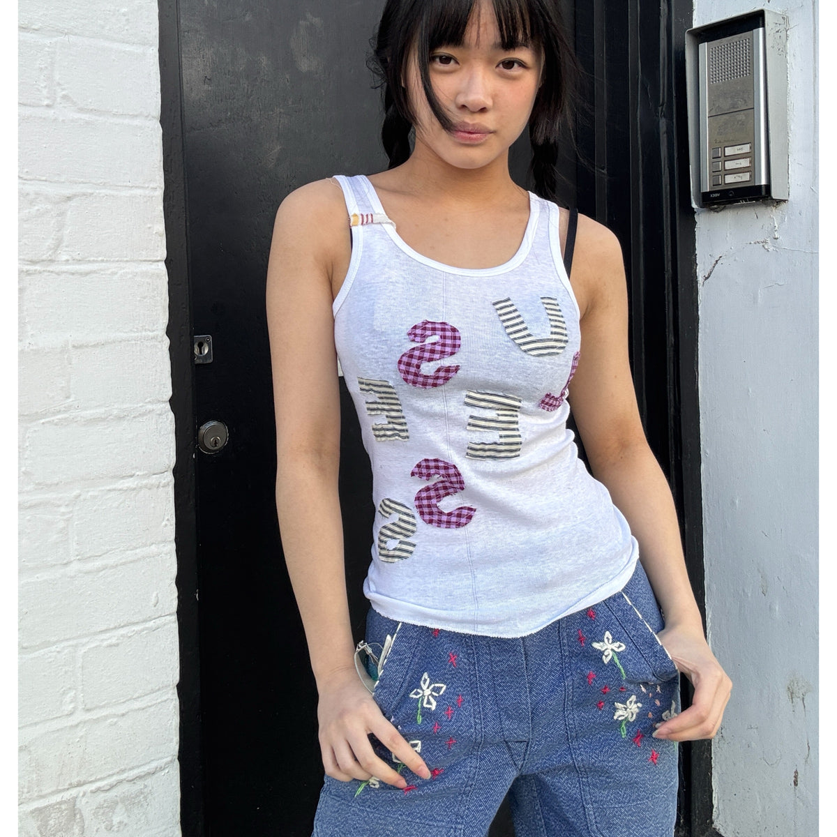 Useless Upcycled White Tank with ‘Useless’ appliqué