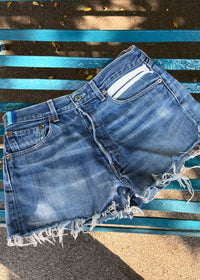 047. Levi's Cut Offs White Tape