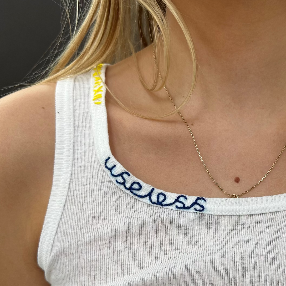 *NEW* Useless White Tank With Blue Stitch Logo